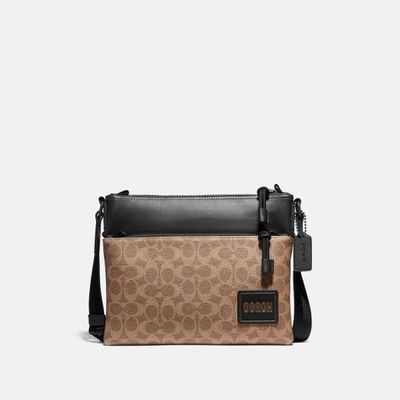 bolsa cruzada coach hombre