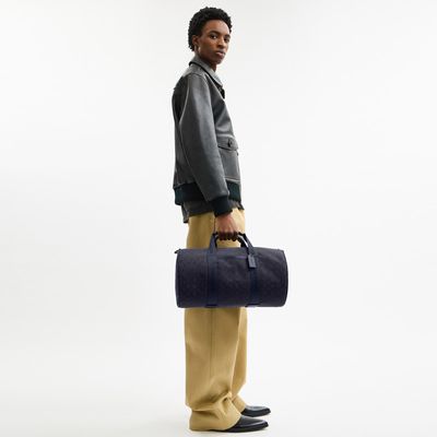 maleta-theo-duffle-en-signature-CBF22-DWP