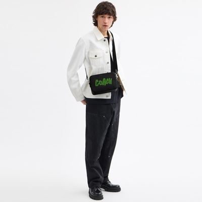 bolsa-crossbody-charter-24-en-rad-coach-logo-CBN34-BLC