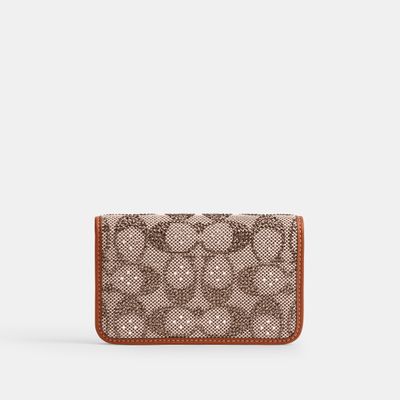 cartera-pequena-coach-en-jacquard-crystal-signature-CCD16-LHBAR