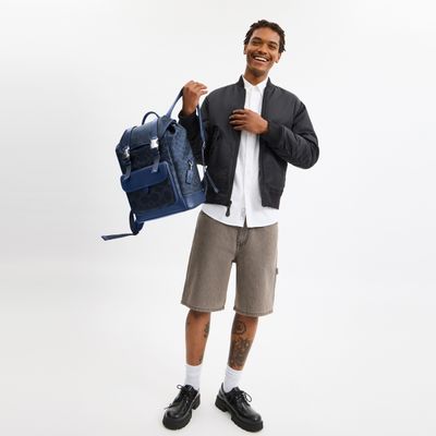 Mochila-Coach-League-en-Signature-CBJ64-XR9