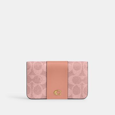 tarjetero-coach-essential-slim-canvas-signature-cr542-b4yu2